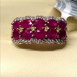 2.12 ctw Rubies, .05 ctw yellow diamonds, .25ctw diamonds, 14kt yellow gold